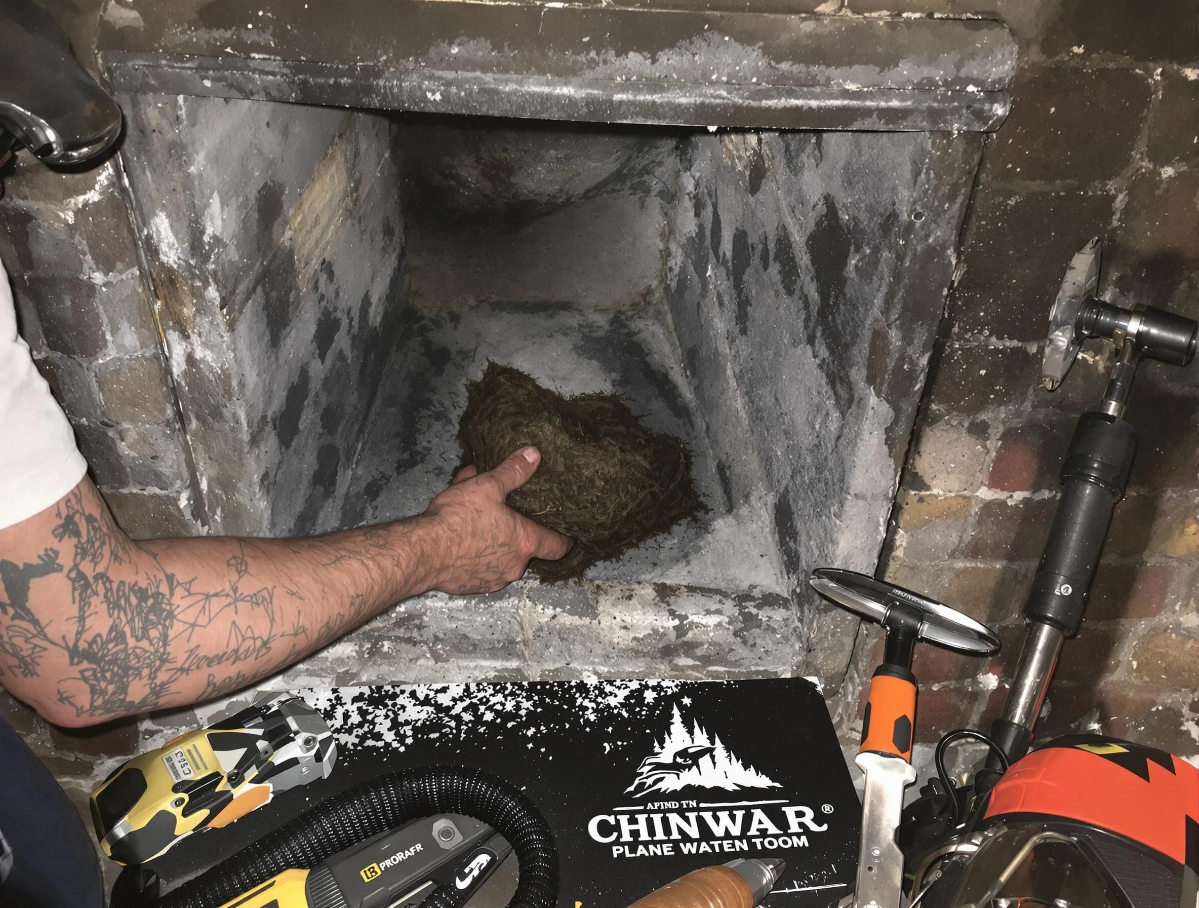 Forest Park Chimney Sweep safely removing debris and screening chimney in Forest Park, GA